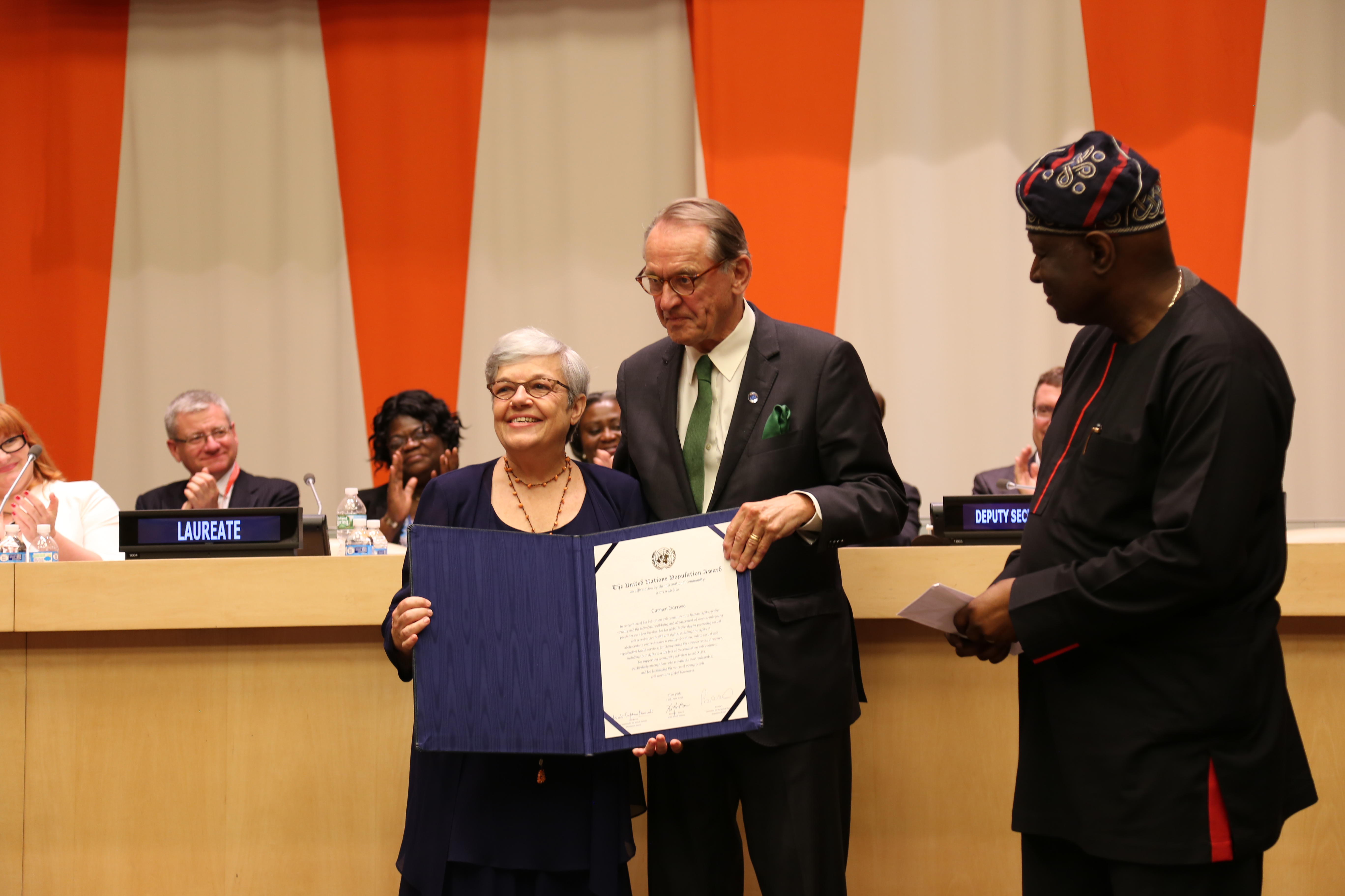 Carmen Barroso receiving her Awards