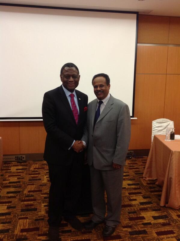 Dr. Babatunde Osotimehin, UNFPA, and Mr Melesse, IPPF, shaking hands. credits: UNFPA
