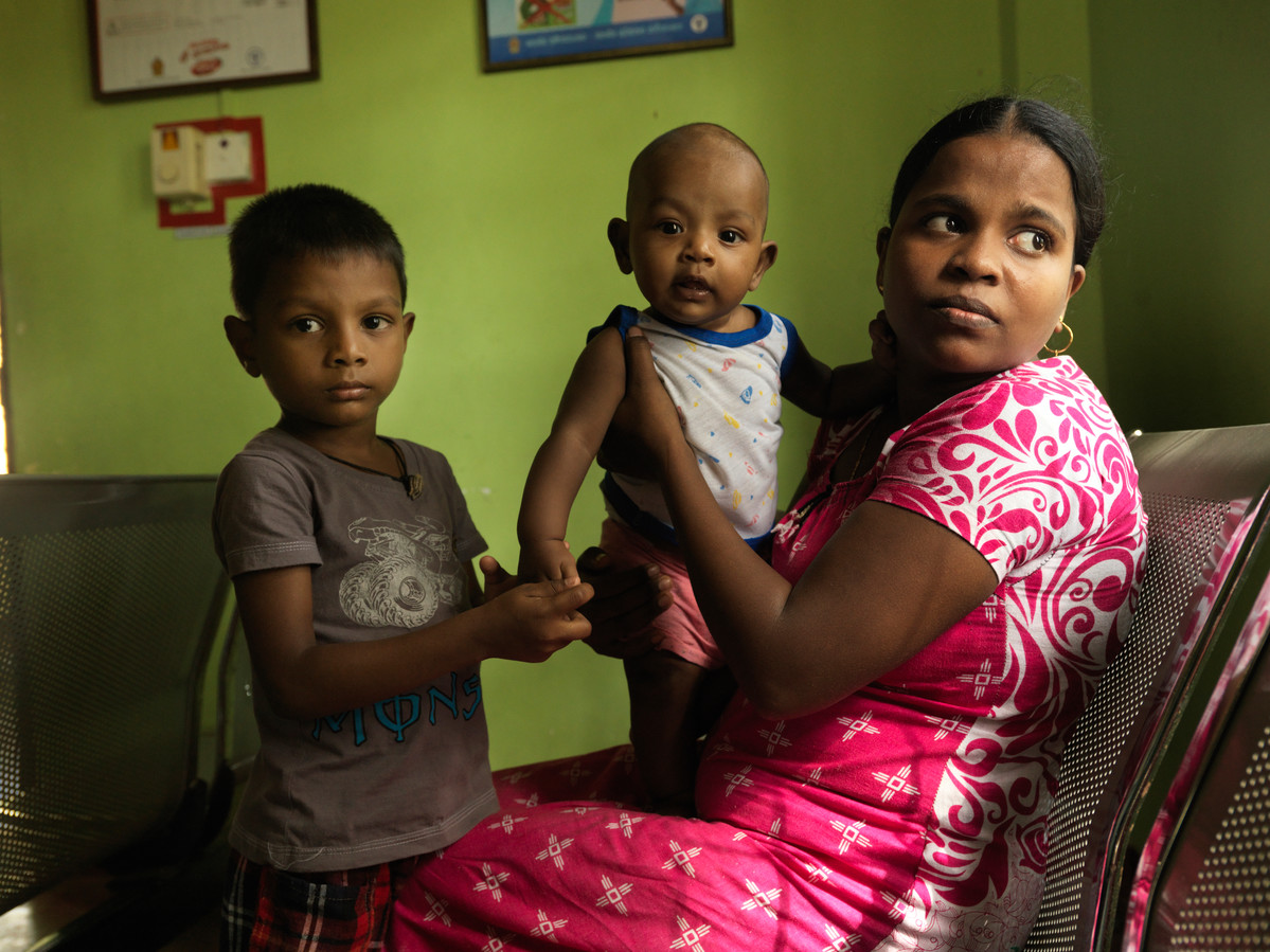 Mother will children at clinic