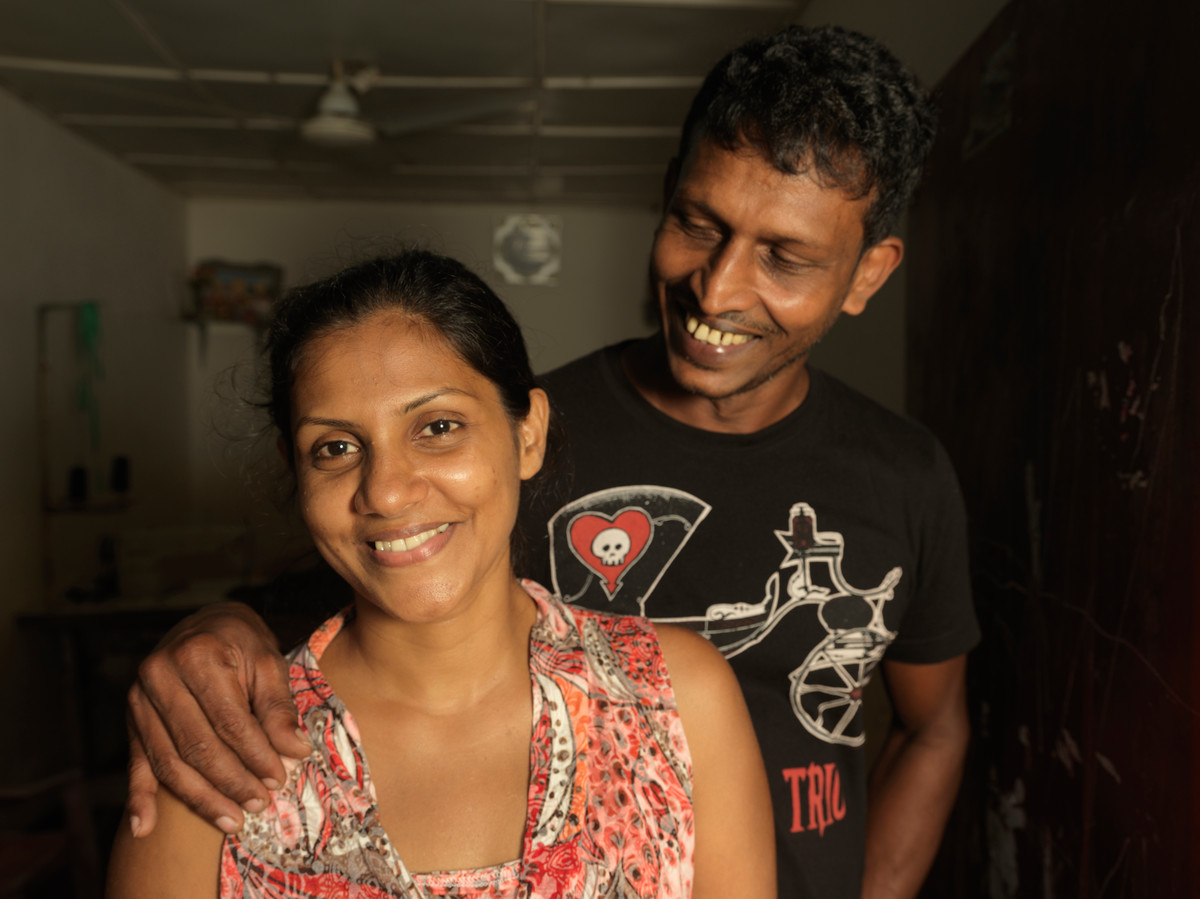 A couple affected by the floods in Sri Lanka