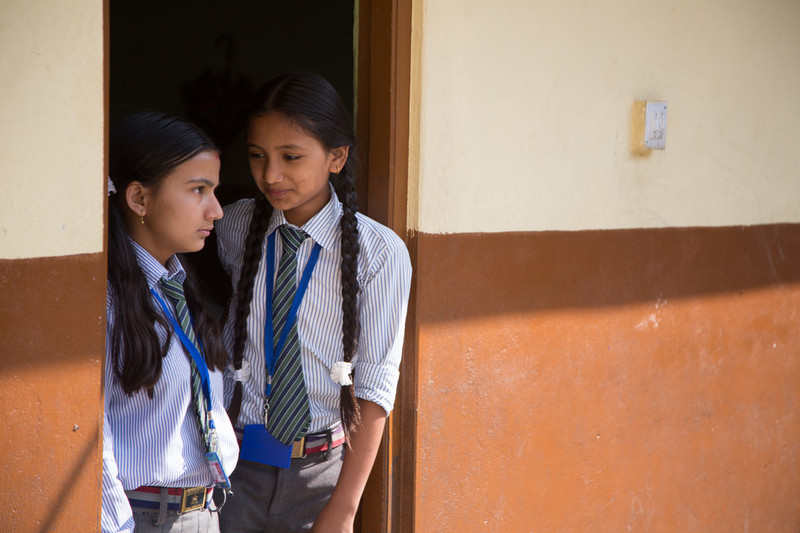 School girls talking.