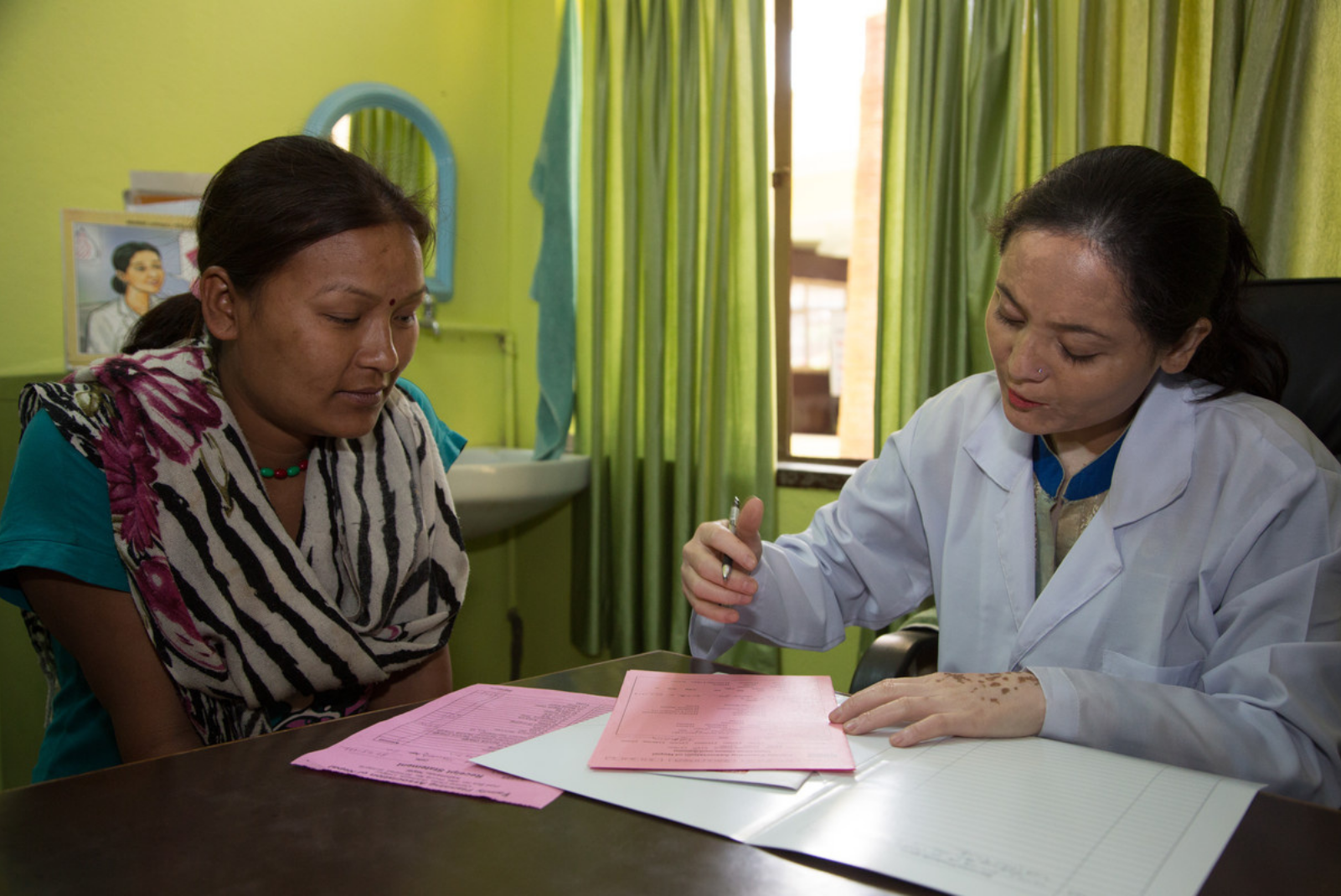 A healthcare worker with a client