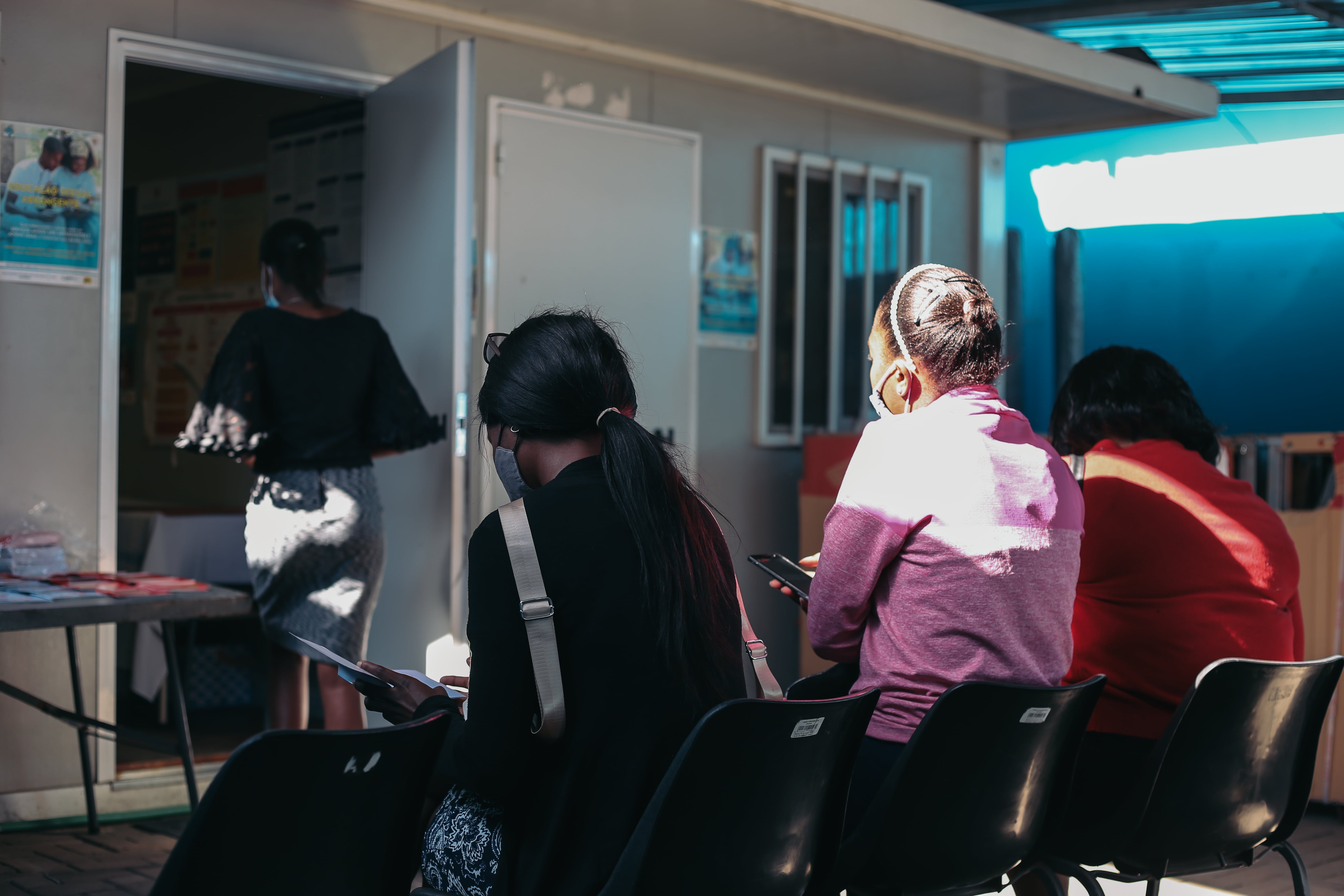 Young people at the center wait to be seen