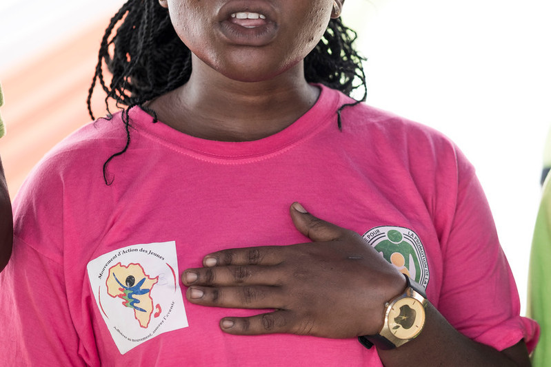 Youth volunteer singing 