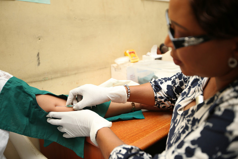 IPPF staff in Nigeria administers an implant contraceptive for a client