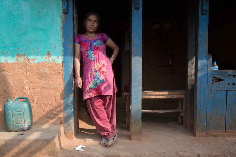 woman outside her house