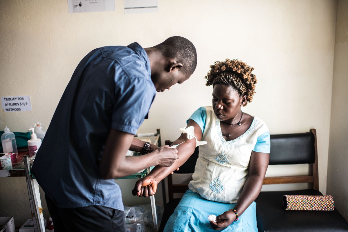 25 year old Dorcas Lanyero gets blood test during a visit to the RHU clinic in Gulu. Lanyero was suffering from abdominal pain but received a full range of tests while she was there.