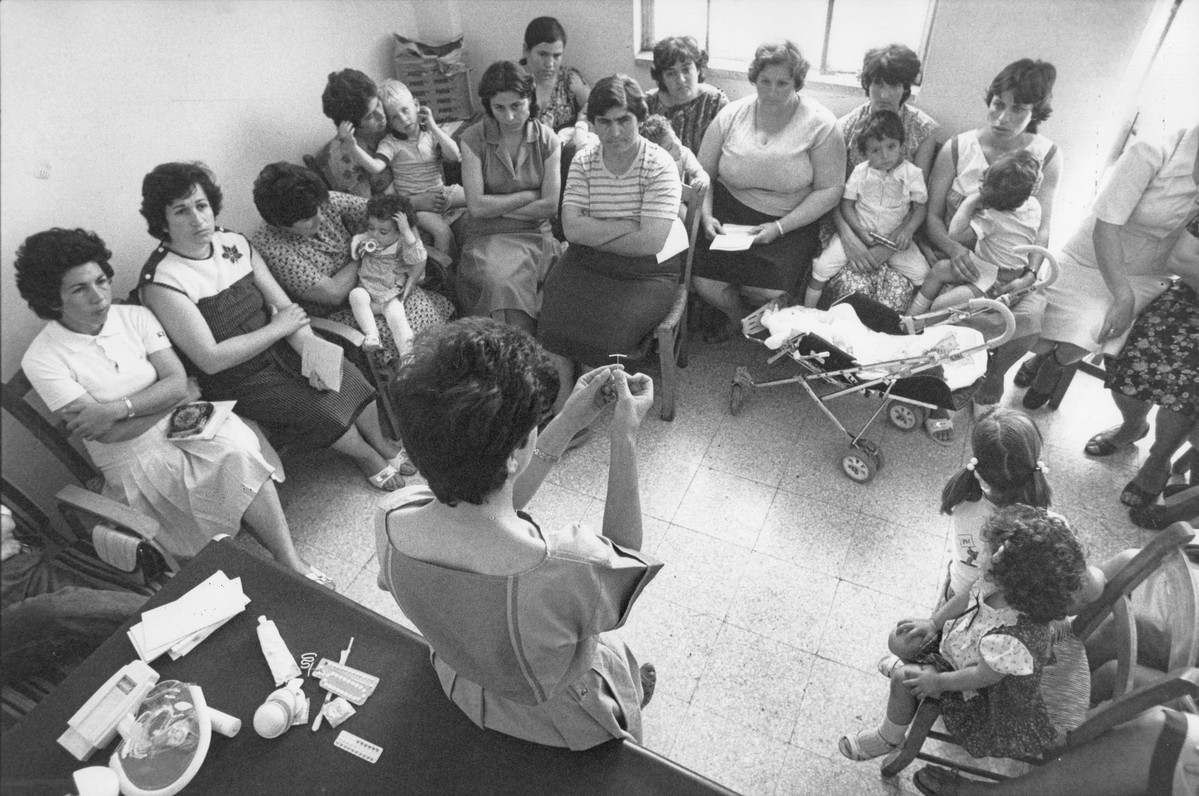 Health workers at the family planning clinic running a session on types of contraceptive methods. Cyprus, 1985