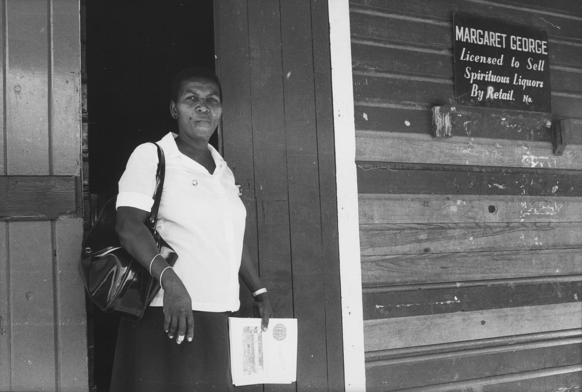 Margaret George, one of two GPPA community outreach workers, outside her shop which distributes contraception to the local community. Grenada, 1982