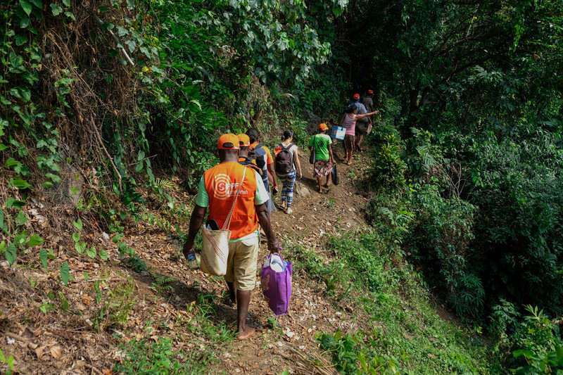 The team hiked for hours along the volcano's mountainside to reach remote communities. 