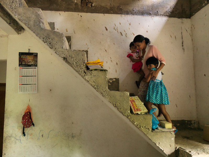 Nimal* and her family were asleep when the floods came into their house. She and her husband took their young children to safety upstairs. Since the floods, Nimal and her family attended the clinic set up by The Family Planning Association of Sri Lanka (FPA-SL), and received medical care and gender based violence training. “We were all sleeping in this house when the flood came in the night. When we woke up we were surrounded by four feet of water in the house. Our van and bicycle were damaged."