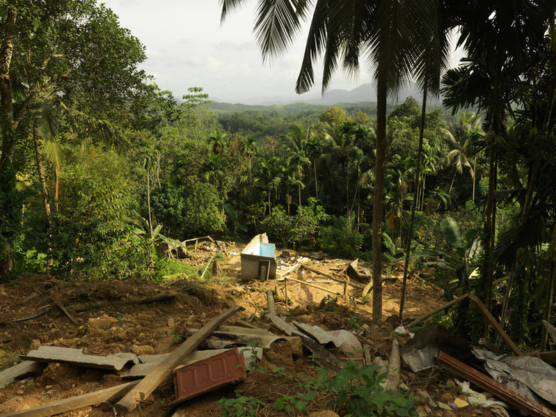 The rains and flash floods caused widespread destruction to buildings and roads. 