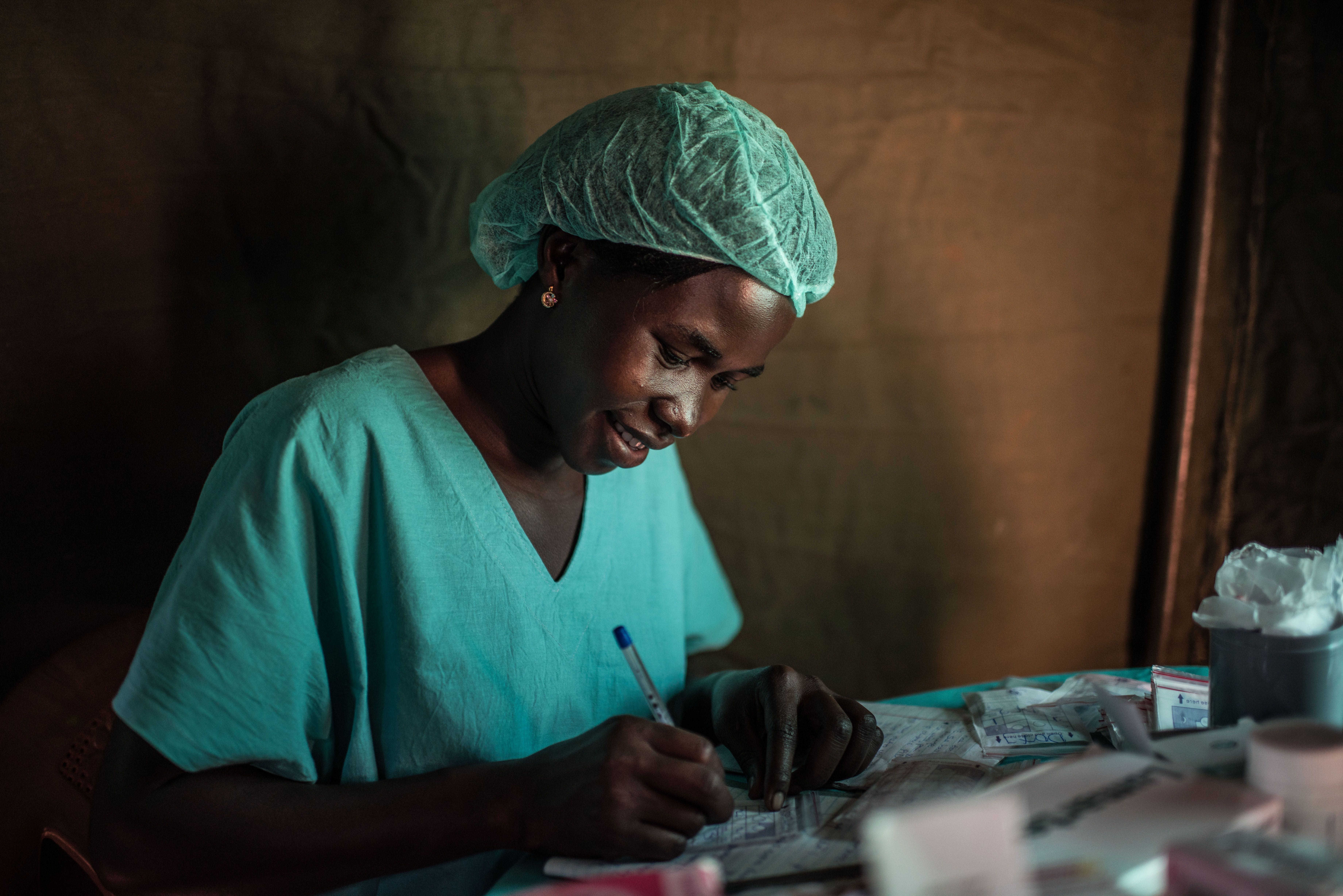 Gertrude Atikuru, RHU staff nurse, at the mobile clinic. 