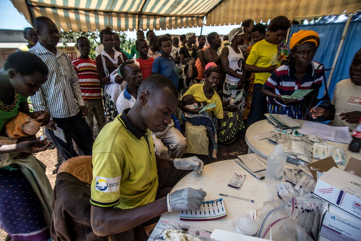 Laboratory technician, Denis Bongoyinge, carries out rapid testing for HIV, STIs, Hep B and malaria. 