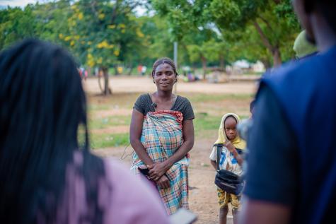 A women and a child stand looking at the camera in Malawi