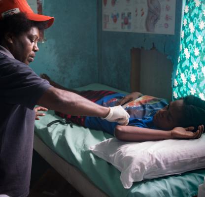 Nurse Leias Obed attending to a patient