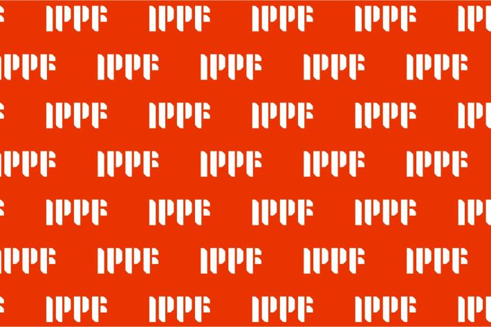 IPPF Logo in white step and repeat on a red background