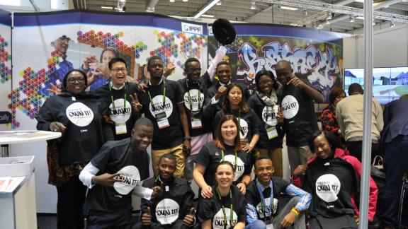 Young people wearing the #KnowItOwnIt T-shirts
