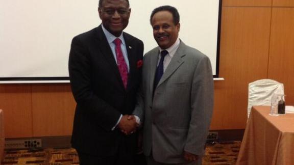 Dr. Babatunde Osotimehin, UNFPA, and Mr Melesse, IPPF, shaking hands. credits: UNFPA