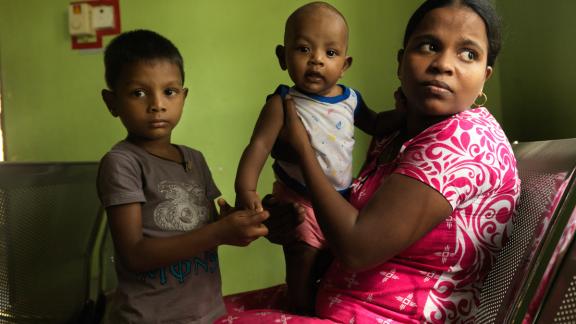 Mother will children at clinic