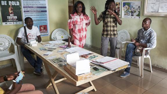A group of peer educators giving a lesson on contraception and sexual health in Cameroon
