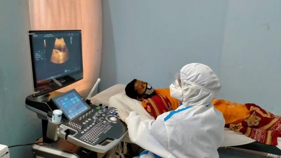 a woman received a scan at a clinic in Bangladesh during covid-19
