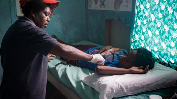Nurse Leias Obed attending to a patient