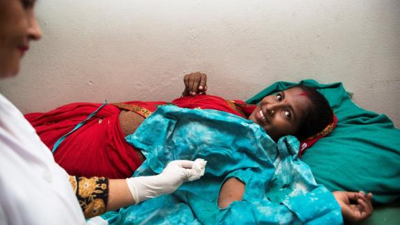 woman receiving an implant