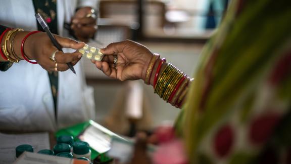 Client receiving medicine. 