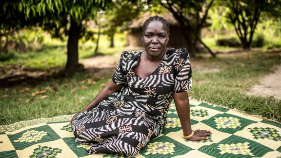 Woman sitting down. 
