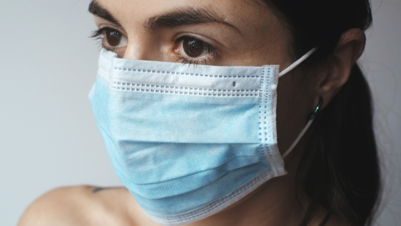 A woman in a mask