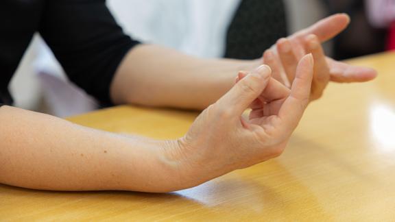 A close up of a persons hands in a clinic in Macedonia 