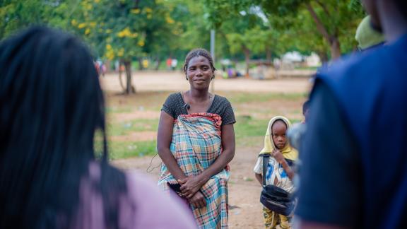 A women and a child stand looking at the camera in Malawi