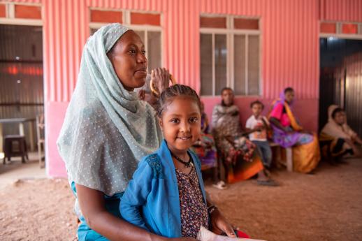 Women and children waiting to be seen at the clinic.
